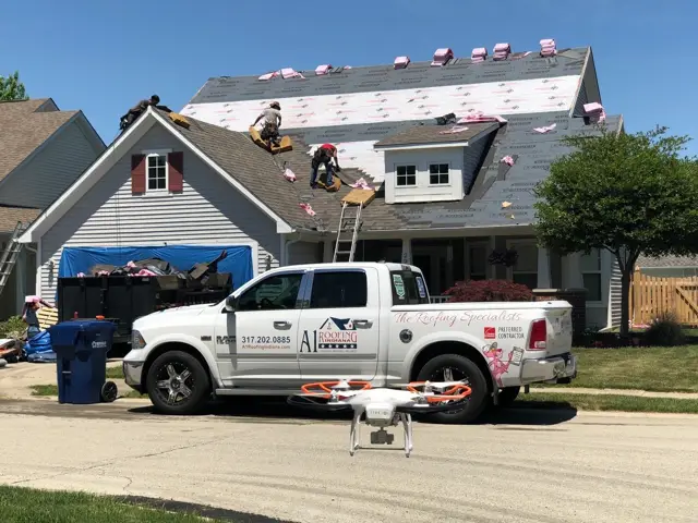 Crew, truck and drone on a job